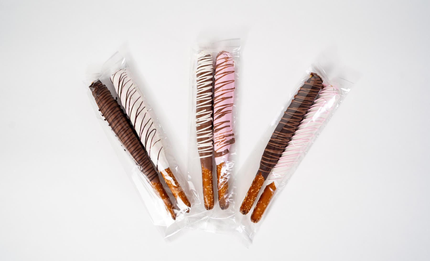 Caramel chocolate dipped pretzel rods